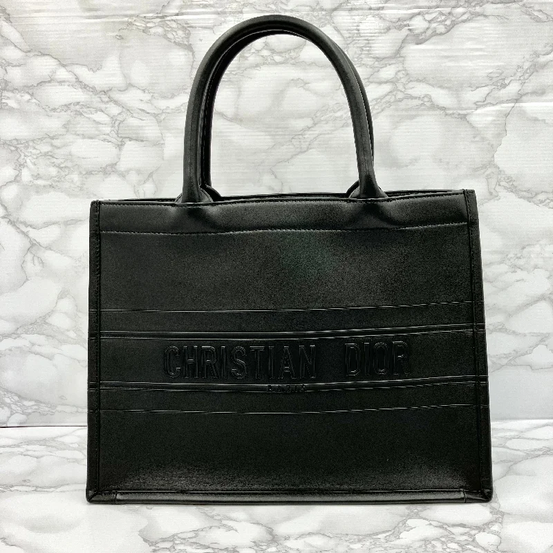 Dior: A Tradition of Excellence in HandbagsChristian Dior leather book tote medium