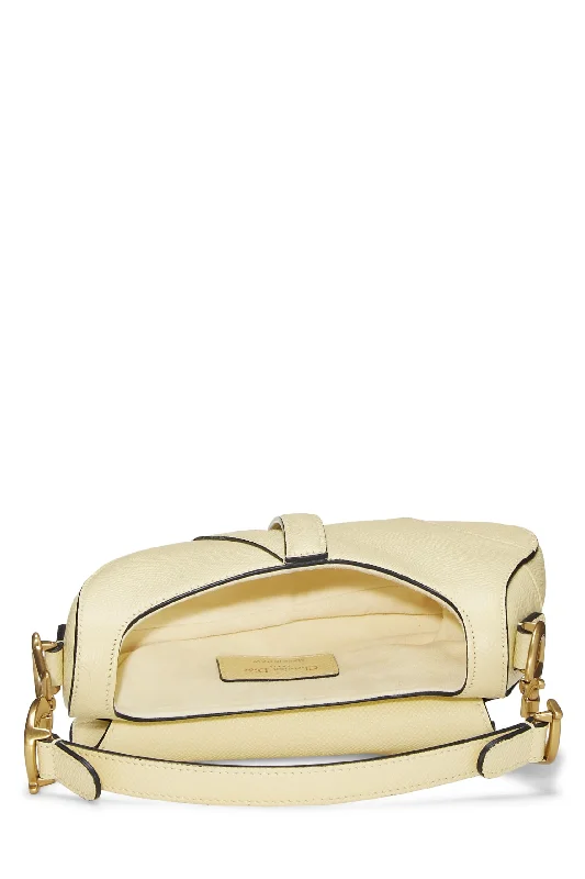 Dior’s Latest Bag Collection: The Pinnacle of EleganceDior,  Cream Leather Saddle Bag Mini, Yellow