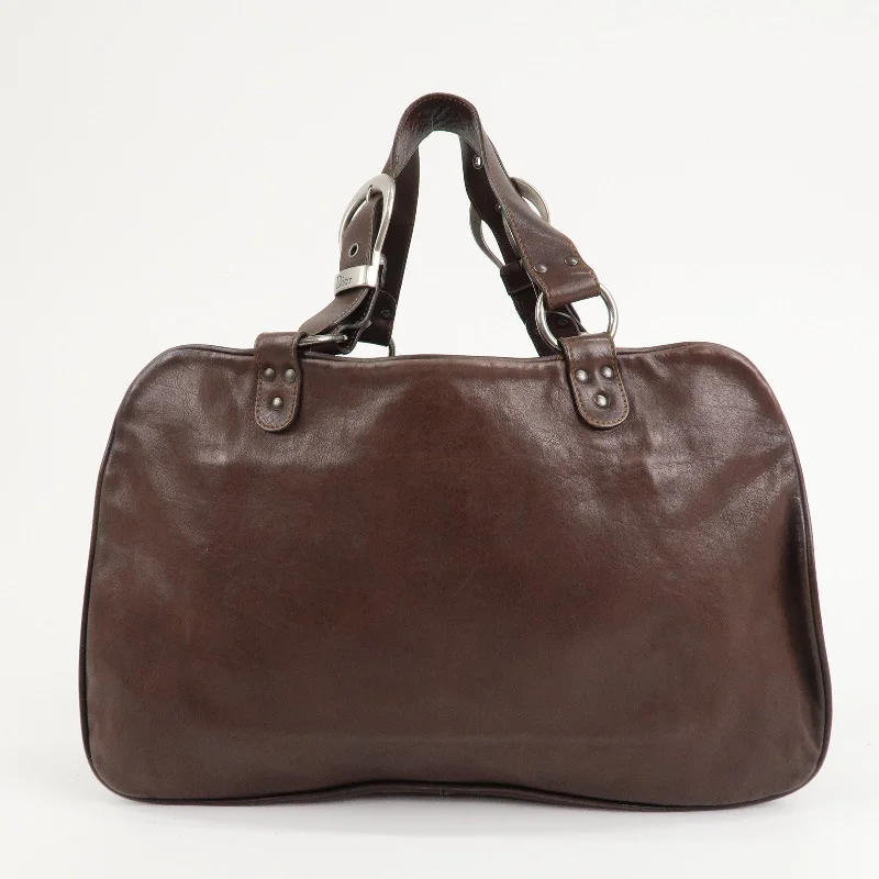 Luxury Meets Artistry: Dior BagsChristian Dior Gaucho Leather Saddle Hand Bag Brown Silver HDW