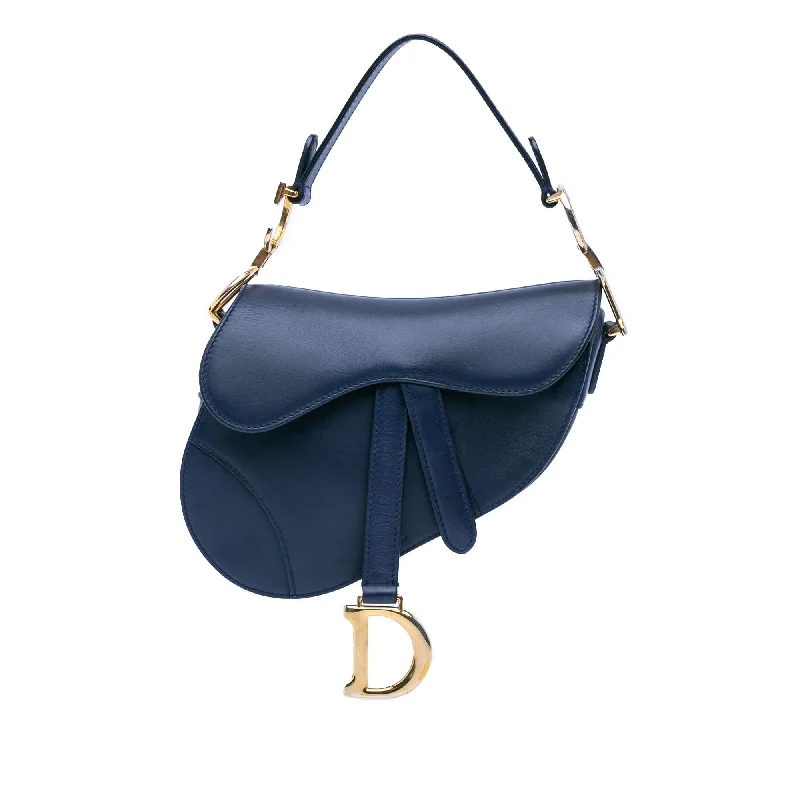 Dior’s Legendary Craftsmanship in Every BagDior Mini Leather Saddle (SHG-E0HuBr)