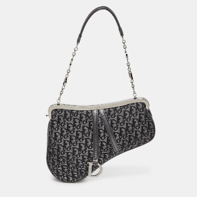 Dior Bags: The Fashion Icon’s Must-HaveDior /grey Lurex Fabric And Leather Vintage Saddle Frame Pochette