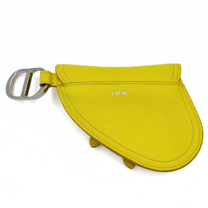 A Touch of Class: Dior BagsDIOR Saddle pouch key ring in fluorescent yellow leather