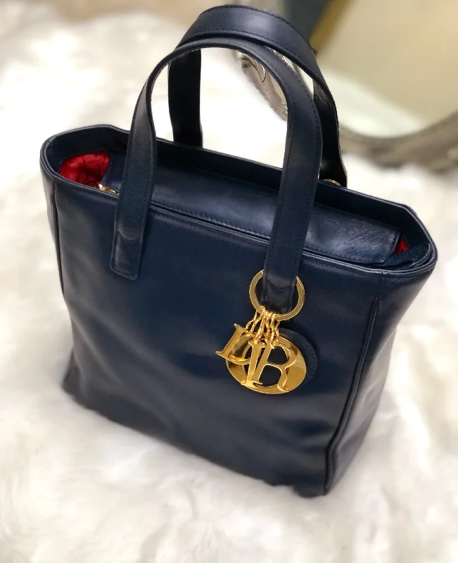 Unlock Timeless Luxury with Dior HandbagsChristian Dior Charm Leather Handbag Navy Vintage Old 6ryite