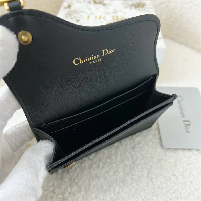 Dior: A Tradition of Excellence in HandbagsDior Saddle Flap Card Holder in Black Grained Calfskin AGHW