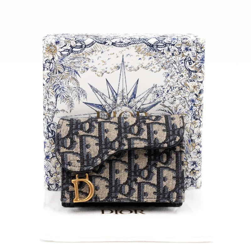 Discover Dior’s Iconic Handbags CollectionSaddle Flap Card Holder Blue Dior Oblique Jacquard