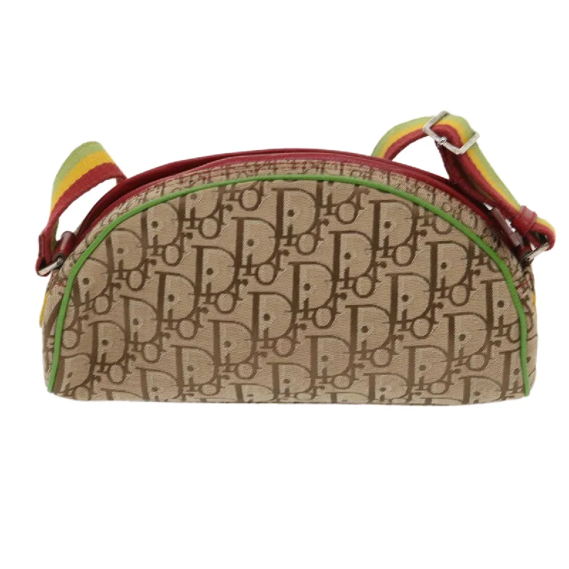 Explore Dior’s Iconic Bags and AccessoriesCHRISTIAN DIOR Trotter Canvas Shoulder Bag Rasta Color Beige Auth 47578