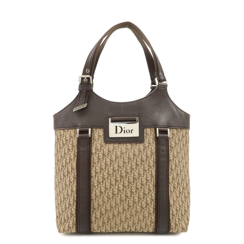 Discover the Legacy of Dior BagsChristian Dior Trotter Canvas Leather Tote Bag Beige Brown