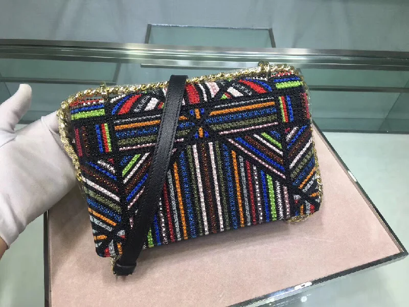 Refined Elegance: Dior’s Signature HandbagsChristian Diorama Canvas Bag Embroidered With Multi-coloured Stripes