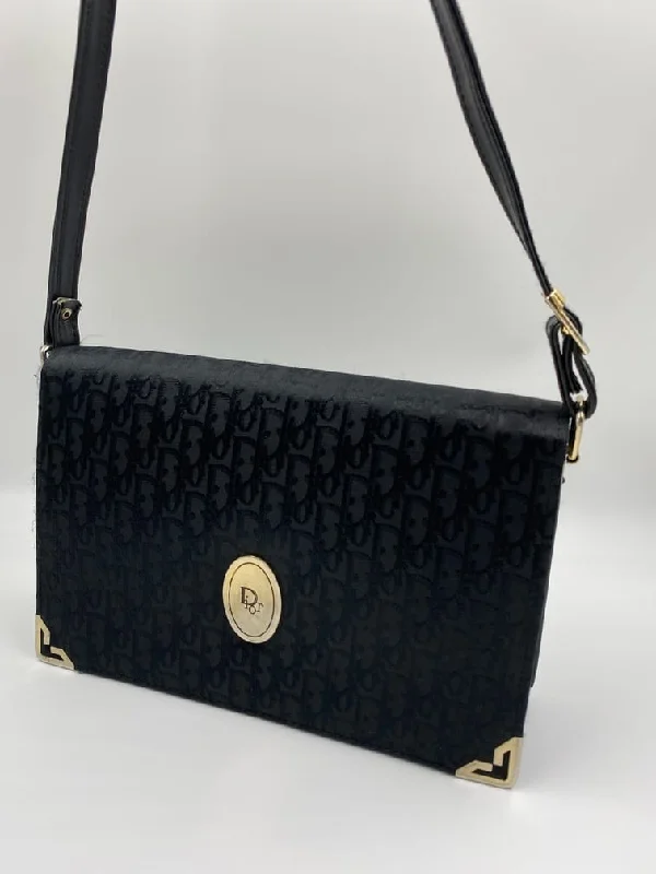 Dior: Luxury Crafted for the Modern WomanChristian Dior Vintage  logo Bag