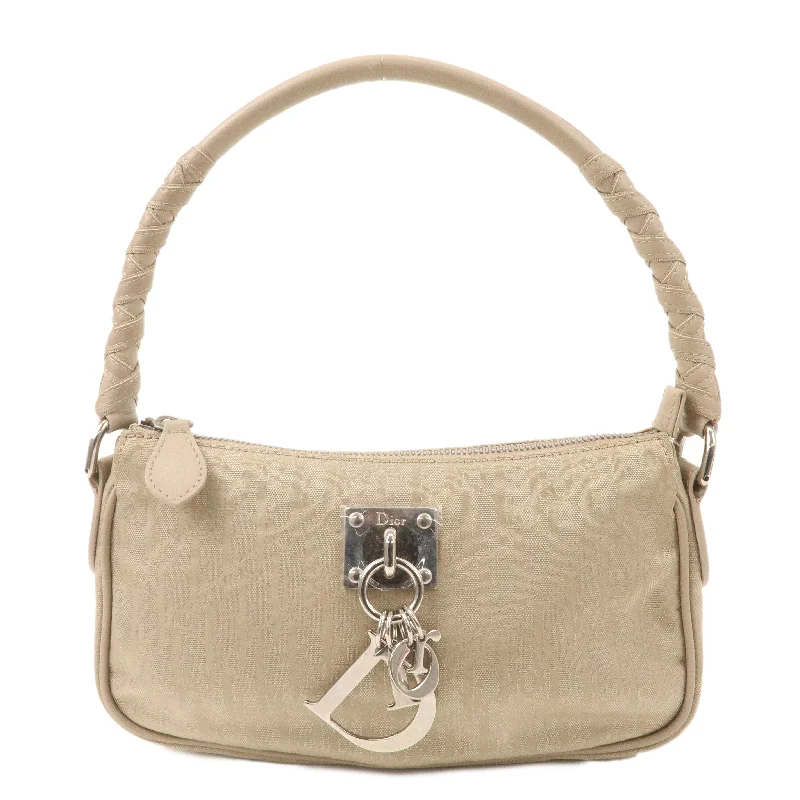 Make a Statement with Dior BagsChristian Dior Trotter Nylon Leather Shoulder Bag Beige