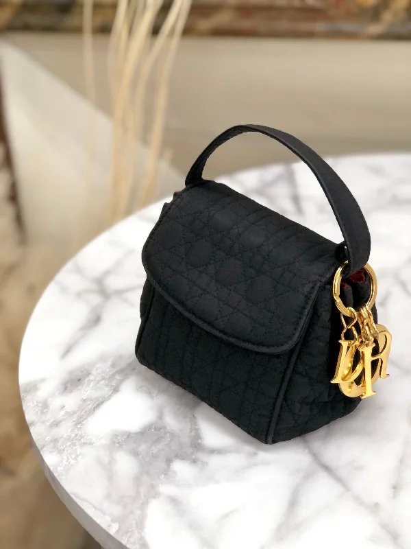 Luxury That Speaks: Dior BagsChristian Dior Cannage Charm Nylon Mini Handbag Black Vintage Old kjas5s