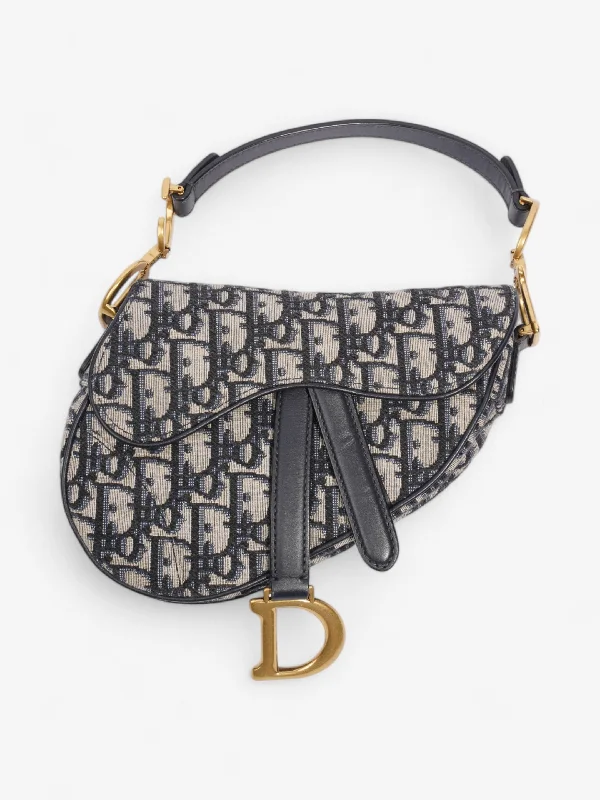 Explore Dior’s Iconic Bags and AccessoriesChristian Dior Saddle Bag Blue Oblique Canvas Mini