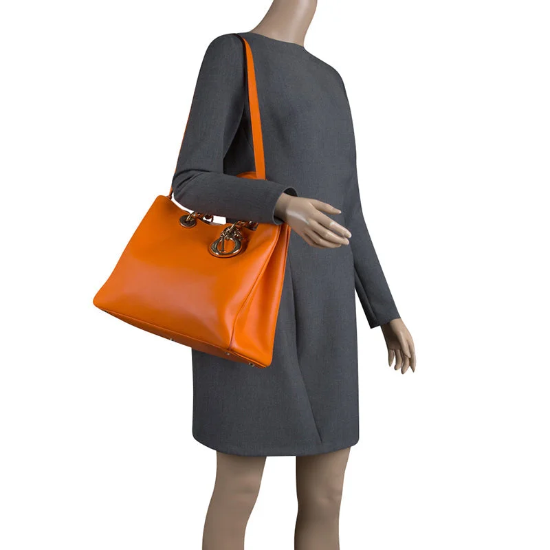 The Perfect Dior Bag for Every SeasonDIOR Orange Leather Large issimo Shopper Tote