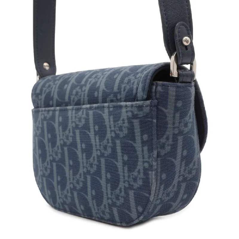 Timeless Fashion with Dior HandbagsDior Oblique Saddle Shoulder Bag Tears Collection Navy 2ADCA435DDO CottonDenim Leather