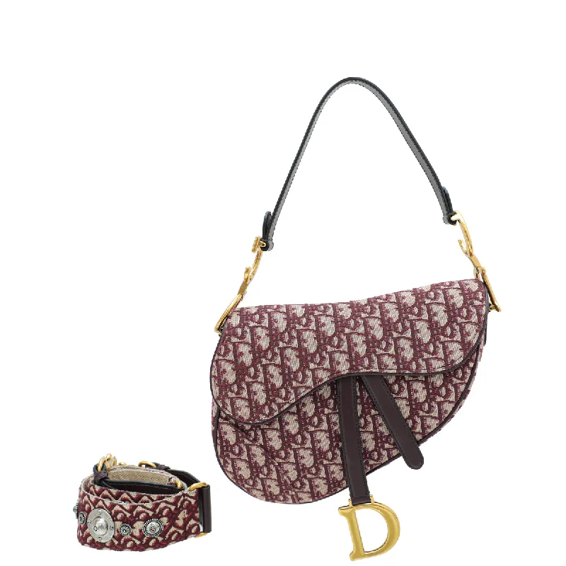 Crafting Beauty: The Dior Handbag CollectionChristian Dior Bordeaux Oblique Jacquard Saddle Bag W/Medallion Strap