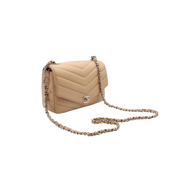 Chanel Street Style Favorite -CHANEL Nude Chevron Flap Bag With Silver Hardware